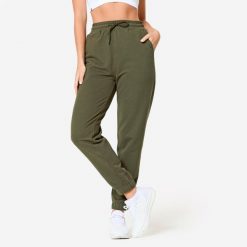 Spodnie dresowe damskie Domyos Gym & Pilates. Brązowe spodnie dresowe DOMYOS, s, bez wzorów, z bawełny, na fitness i siłownię. Za 89.99 zł.