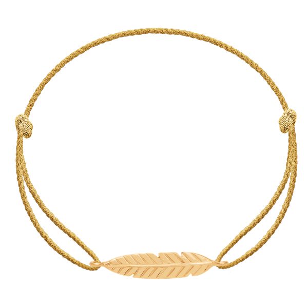 Bransoletka Pióro pozłacane na grubym złotym sznurku premium. Żółte bransoletki Lilou, pozłacane. Za 158.00 zł.