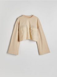 Krótka bluza z łączonych materiałów - beżowy. Brązowe bluzy Reserved, l, bez wzorów, z bawełny, bez kaptura. W wyprzedaży za 29.99 zł.