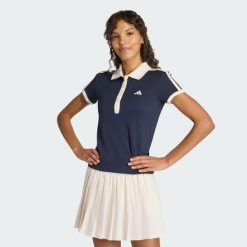 Koszulka Polo Tennis Classics. Niebieskie bluzki Adidas, bez wzorów, sportowe, bez kołnierzyka, bez ramiączek. Za 219.00 zł.