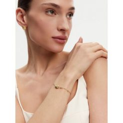 Bransoletka Guess. Żółte bransoletki Guess, złote. Za 129.99 zł.