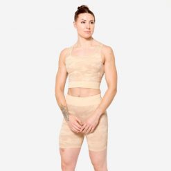 Koszulka fitness damska Domyos crop top. Brązowe topy DOMYOS, xl, bez wzorów, z elastanu, bez kołnierzyka, bez ramiączek. Za 89.99 zł.