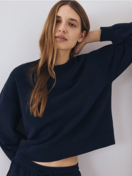 Bluza z dodatkiem modalu - granatowy. Niebieskie bluzy Reserved, l, bez wzorów, z dzianiny, bez kaptura. W wyprzedaży za 59.99 zł.