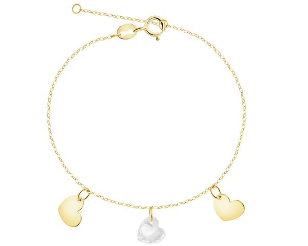 Złota bransoletka z cyrkonią - serca. Żółte bransoletki Apart, z cyrkonią, złote. Za 399.00 zł.