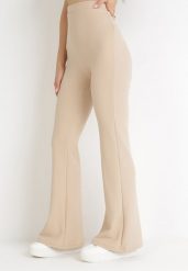 Beżowe Spodnie Dzwony z Gumką w Pasie Milica. Brązowe spodnie materiałowe Born2be, na co dzień, l, bez wzorów, z jeansu, z podwyższonym stanem. Za 89.99 zł.