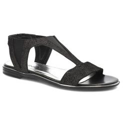 Czarne Sandały Karino Modne Płaskie Buty. Czarne sandały Karino, bez wzorów, ze skóry ekologicznej, bez obcasa, na płaskiej podeszwie, bez zapięcia. Za 169.00 zł.