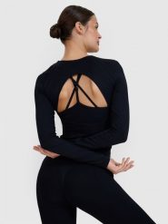 4F Longsleeve do jogi i pilatesu z wycięciem na plecach damski - czarny XS/S. Czarne koszulki sportowe 4f, bez wzorów, z dzianiny, bez ramiączek, na fitness i siłownię. W wyprzedaży za 99.99 zł.