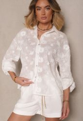 Biała Bawełniana Koszula o Kroju Oversize z Haftem w Kwiatowy Wzór Reisariel. Białe koszule Renee, m, bez wzorów, z bawełny, eleganckie, bez kołnierzyka, bez ramiączek. Za 79.99 zł.