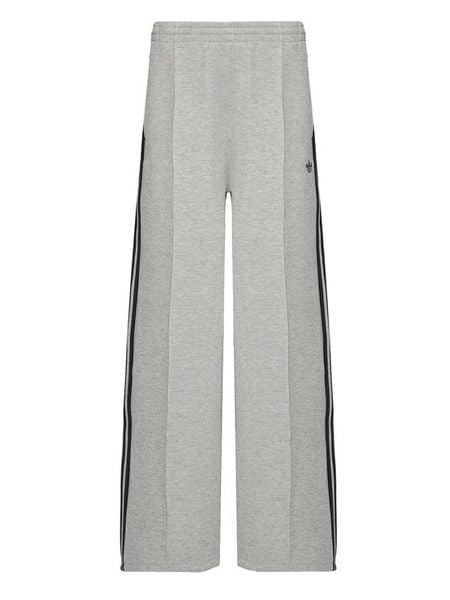 Adidas Spodnie dresowe adicolor Spacer 3-Stripes JV7497 Zielony Wide Leg. Zielone spodnie sportowe Adidas, l, bez wzorów, z dresówki, trekkingowe. Za 349.99 zł.