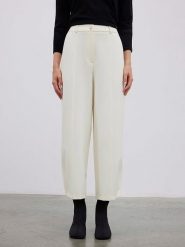 BGN Spodnie w kolorze kremowym rozmiar: 36. Brązowe spodnie materiałowe BGN, na imprezę, bez wzorów, z materiału, z podwyższonym stanem. Za 108.99 zł.