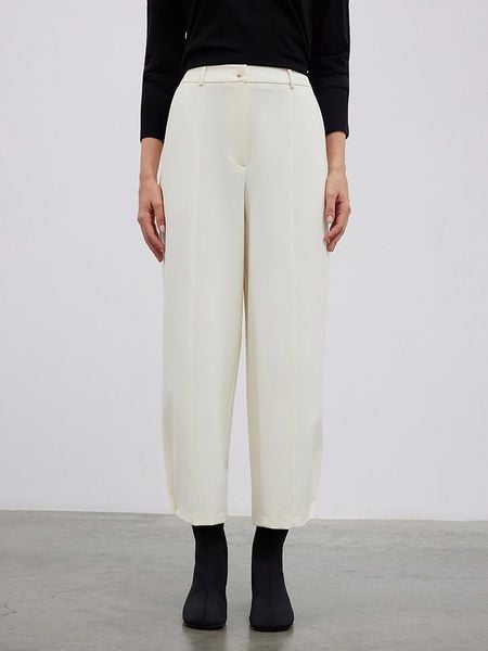 BGN Spodnie w kolorze kremowym rozmiar: 34. Brązowe spodnie materiałowe BGN, na imprezę, bez wzorów, z materiału, z podwyższonym stanem. Za 104.14 zł.