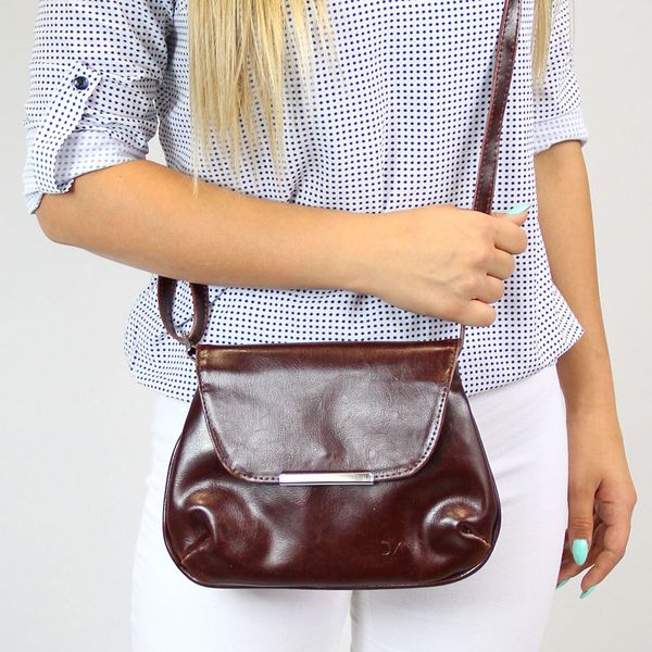 Torebka skórzana damska listonoszka DAN-A T81 koniakowa. Torebki klasyczne DAN-A, bez wzorów, ze skóry, małe, bez dodatków. Za 169.99 zł.