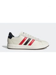 Adidas Sneakersy w kolorze kremowym rozmiar: 42. Brązowe trampki Adidas, bez wzorów, bez zapięcia. Za 234.94 zł.