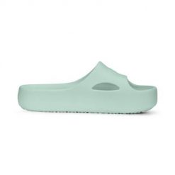 Klapki damskie Puma Shibusa. Zielone klapki Puma, bez wzorów, z materiału, bez obcasa. Za 189.00 zł.