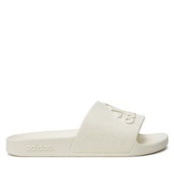 Klapki adidas. Białe klapki Adidas, bez wzorów, bez obcasa. Za 89.99 zł.