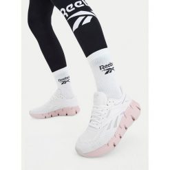 Buty do biegania Reebok. Białe obuwie sportowe Reebok, bez zapięcia, do biegania. Za 369.99 zł.