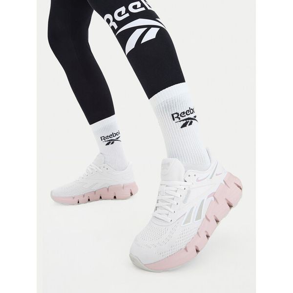 Buty do biegania Reebok. Białe obuwie sportowe Reebok, bez zapięcia, do biegania. Za 332.99 zł.