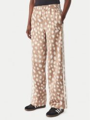 Adidas Spodnie dresowe Firebird KT2144 Brązowy jasny Wide Leg. Brązowe spodnie dresowe Adidas, xs, bez wzorów, z dresówki. Za 349.99 zł.