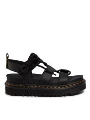 Dr. Martens Sandały Nartilla 24641001 Czarny. Czarne sandały Dr. Martens, bez wzorów, ze skóry, bez obcasa, na koturnie, bez zapięcia. Za 599.99 zł.