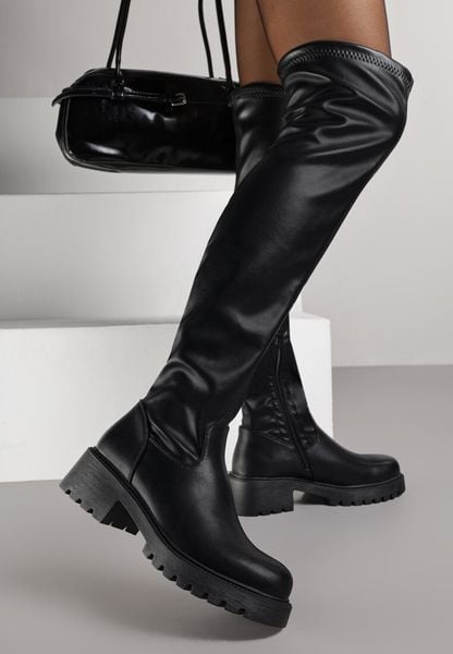 Czarne Kozaki w Stylu Tech Gothic Aderida. Czarne kozaki Renee, z jeansu, bez obcasa, na płaskiej podeszwie, bez zapięcia. Za 169.99 zł.