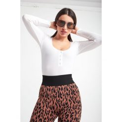 Bluzka WOLFORD. Bluzki Wolford, xs, bez wzorów, bez kołnierzyka, bez ramiączek. W wyprzedaży za 381.07 zł.
