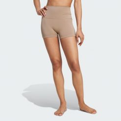 Krótkie legginsy All-Me Sculpt Booty. Brązowe legginsy Adidas, bez wzorów, krótkie. Za 199.00 zł.