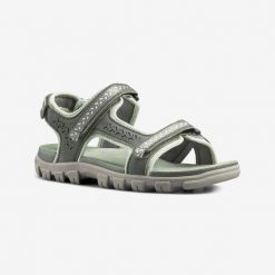 Sandały turystyczne damskie Quechua NH500 skóra. Brązowe sandały QUECHUA, bez wzorów, z kauczuku, sportowe, bez obcasa, bez zapięcia. Za 199.99 zł.