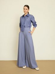 BGN Spodnie w kolorze niebieskim rozmiar: 34. Niebieskie spodnie materiałowe BGN, na co dzień, bez wzorów, z materiału. Za 121.99 zł.