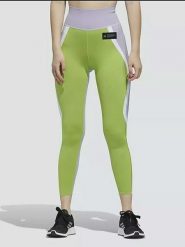 Adidas Legginsy sportowe w kolorze fioletowo-zielonym rozmiar: XS. Różowe legginsy Adidas, xs, bez wzorów, z materiału, outdoorowe. Za 96.83 zł.