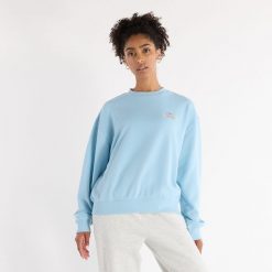 Bluza damska New Balance WT43559CUH – niebieska. Niebieskie bluzy New Balance, xl, bez wzorów, z bawełny, bez kaptura. Za 129.99 zł.