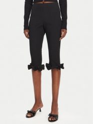 ROTATE Spodnie capri 113809100 Czarny Slim Fit. Czarne spodnie materiałowe ROTATE, bez wzorów, z materiału. Za 459.99 zł.
