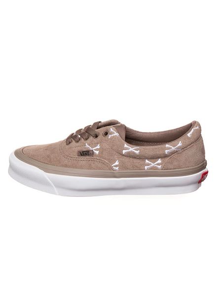 Vans Skórzane sneakersy w kolorze jasnobrązowym rozmiar: 38,5. Brązowe trampki Vans, bez wzorów, z materiału, bez zapięcia. Za 247.99 zł.
