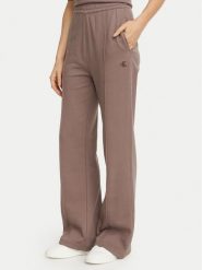 Calvin Klein Jeans Spodnie dresowe Monogram LV047H220G Beżowy ciemny Regular Fit. Brązowe spodnie dresowe Calvin Klein Jeans, m, bez wzorów, z bawełny. Za 369.99 zł.