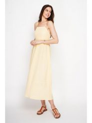 Le Jardin du Lin Sukienka w kolorze żółtym rozmiar: 38. Żółte sukienki Le jardin du lin, bez wzorów, bez kołnierzyka, bez ramiączek, maxi, rozkloszowane. Za 159.95 zł.