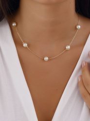 Luja Bijoux Pozłacany naszyjnik z perłami - dł. 42 cm rozmiar: onesize. Żółte naszyjniki Luja Bijoux, z perłą, metalowe. Za 48.45 zł.