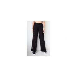 Spodnie dresowe damskie szerokie 2skin I love pilates black. Czarne spodnie dresowe 2SkIN, bez wzorów, z dresówki. Za 259.00 zł.