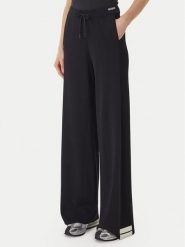 Guess Spodnie dzianinowe V6GB06 Z0651 Czarny Regular Fit. Czarne spodnie materiałowe Guess, xs, z aplikacjami, z dzianiny. Za 569.99 zł.