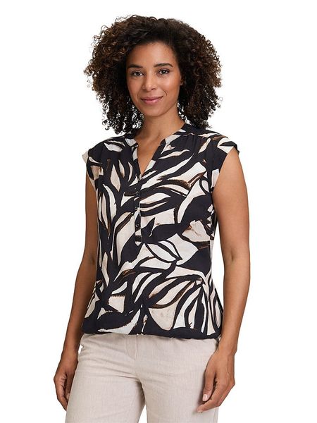 BETTY & CO Bluzka w kolorze czarno-kremowym rozmiar: 38. Czarne bluzki Betty & Co, bez wzorów, bez kołnierzyka, bez ramiączek. Za 124.95 zł.
