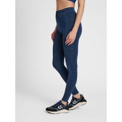 Damskie legginsy mid-rise Hummel Shaping. Niebieskie legginsy Hummel, s, bez wzorów, z materiału. Za 149.50 zł.