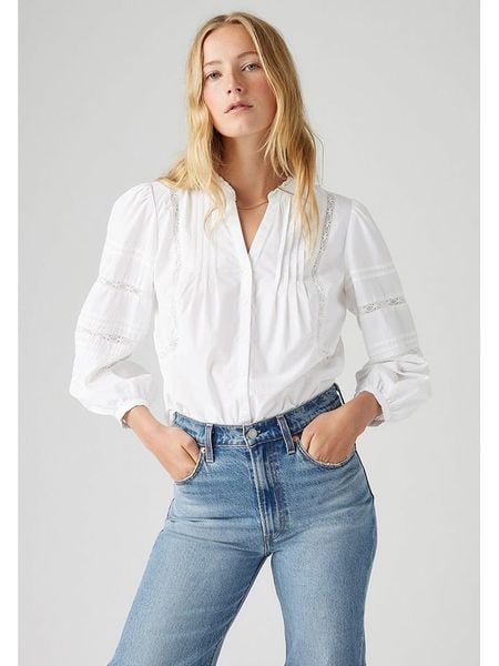Levi's Bluzka w kolorze białym rozmiar: L. Białe bluzki Levi's®, l, bez wzorów, z bawełny, bez kołnierzyka, bez ramiączek. Za 153.71 zł.