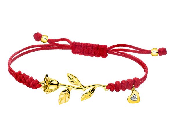 Bransoletka z elementami żółtego złota i diamentem - róża, serce - 0,005 ct - próba 375. Żółte bransoletki Apart, z diamentem, złote. Za 1,090.00 zł.