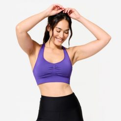Stanik sportowy Decathlon. Fioletowe bielizna sportowa DECATHLON, l, bez wzorów, ze skóry. W wyprzedaży za 69.99 zł.
