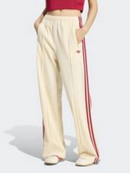 Adidas Spodnie dresowe w kolorze kremowym rozmiar: S. Brązowe spodnie dresowe Adidas, s, bez wzorów, z dresówki. Za 209.95 zł.
