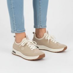 Półbuty damskie Rieker, cholewka ze skóry ekologicznej sportowa sylwetka wsuwane miękka amortyzowana podeszwa, beżowe, 44562-62. Brązowe półbuty wsuwane Rieker, bez wzorów, ze skóry ekologicznej, sportowe, bez obcasa, na płaskiej podeszwie, bez zapięcia. Za 369.00 zł.