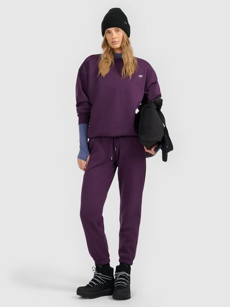 4F Spodnie dresowe joggery damskie - fioletowe M. Fioletowe spodnie dresowe 4f, m, bez wzorów, z dresówki, z podwyższonym stanem. Za 129.99 zł.