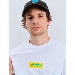 Koszulka sportowa MANTO Block 24 z krótkim rękawem. Białe koszulki sportowe MANTO, bez wzorów, bez ramiączek. Za 84.99 zł.