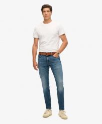 Superdry Denimowe Jeansy Slim Vintage z Bawełny Organicznej. Niebieskie jeansy Superdry, z aplikacjami. Za 408.75 zł.