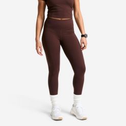 Legginsy fitness damskie Domyos wysoki stan. Brązowe legginsy DOMYOS, l, bez wzorów, z elastanu, z podwyższonym stanem. Za 119.99 zł.
