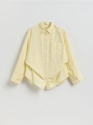 Bawełniana koszula w paski - jasnożółty. Żółte koszule Reserved, l, bez wzorów, z bawełny, bez kołnierzyka, bez ramiączek. Za 139.99 zł.