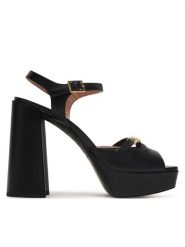 LOVE MOSCHINO Sandały JA1604CG1OIE0000 Czarny. Czarne sandały Love Moschino, bez wzorów, ze skóry, bez obcasa, na słupku, bez zapięcia. Za 1,669.00 zł.